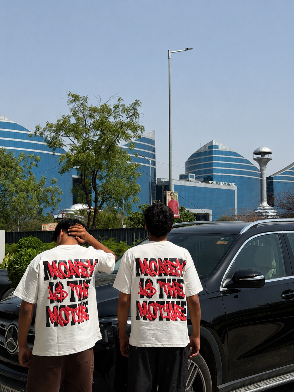 MONEY IS THE MOTIVE TEE